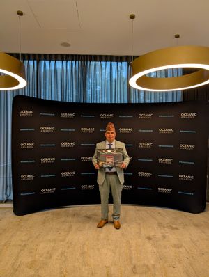 Chef and owner tej Bhandari with award