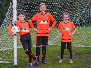Supporting image for story: Midlands digger giant gets young footballers kitted out in Rugeley