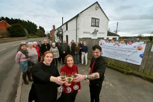 MP Helen Morgan with landlord Mike McAllister and his partner Sapphire Everson at the Horse and Jockey  