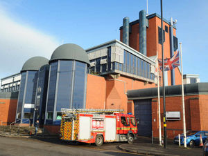 Firefighters arrive at the jail