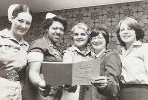 Nurses from Sandwell hospitals were presented with certificates to mark the completion of their training by William Timmington of the Area Health Authority. The photograph shows (from left) Yvonne Moore, Floreth Reynolds, Jacqueline Morgan, Catherine Webb and Elaine Clements, May 1979.