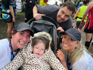 Supporting image for story: Mum completes double challenge for garden appeal