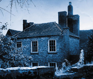 Cann Hall, Bridgnorth, September 7, 1956. The caption to this picture said: 'Dirty and deserted behind its defence of overgrown trees, Bridgnorth's Jacobean Cann Hall stands forgotten. Soon it must come down to ease traffic conditions.' 