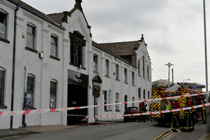 Firefighters were lifted onto the roof to tackle the blaze