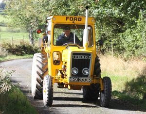 Shining golden in the September sunshine John Williams of Newtown with his Ford 333