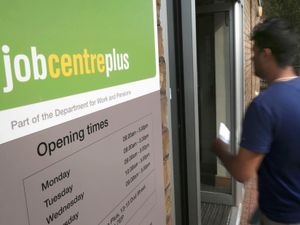 A man walks into a Jobcentre Plus