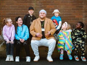 Supporting image for story: Telford's singing builder who won hearts on The Voice pops into primary school to inspire pupils