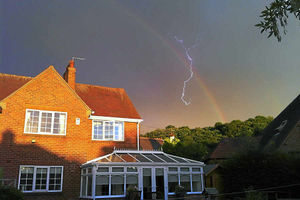 Supporting image for story: Snapper captures rare picture of lightning and rainbow in Telford