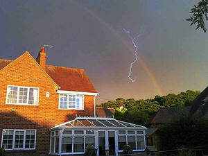 Supporting image for story: Snapper captures rare picture of lightning and rainbow in Telford