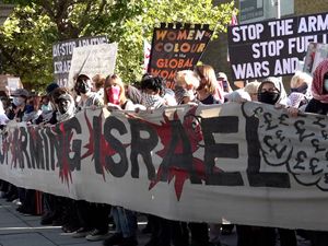 Supporting image for story: Three arrested after protest outside defence event