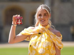 Supporting image for story: William tells Olympian that Charlotte a keen runner during investiture ceremony