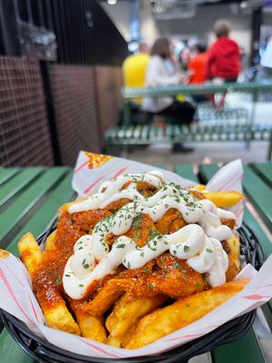 Spicy chicken loaded fries from House of Habesha at Cambridge Street Collective in Sheffield