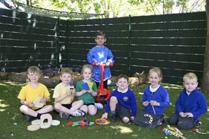 Early Years Children at Landywood Primary School enjoying new equipment funded by Landywood Stores L - R Harrison, Finn, Ava, Imaan, Casey, Hope, George