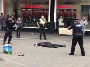 Supporting image for story: WATCH: Dramatic moment police aim Tasers at man with knife in Birmingham city centre