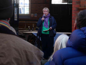 Chair of the Trustees of Kington Walks, Sarah Lee tells the crowd about the award. Image by Andy Compton