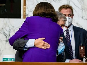 Supporting image for story: Democratic senator condemned by allies for hugging Republican rival