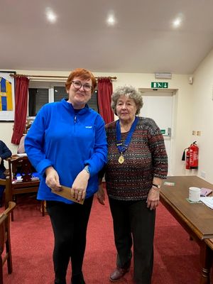 The final prize - county secretary Louise Cotton accepts Wrockwardine Wood's runners-up prize from Rose Southgate