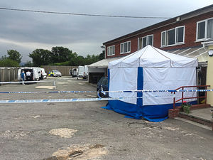 A forensics tent at the scene