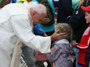 Children queuing for communion during Pope Francis’ closing Mass at the World Meeting of Families in Dublin’s Phoenix park in 2018