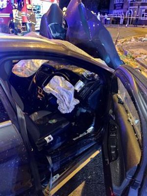 The car was left unrecognisable after the crash. Photo: @SuttonCfld_Fire