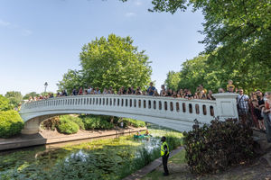 Spectators gather on the footbridge to watch the duck race Credit: Ian Knight / Z70 Photography