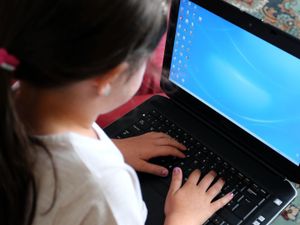 Supporting image for story: Laptops handed out but young pupils ‘miss out’
