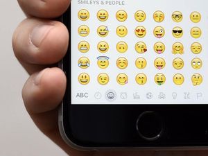 Supporting image for story: Apple previews new emoji, including woman with headscarf and new smiley faces