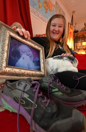 Rosie Davies, aged 11, from Bucknell, with her rabbit, Bella.
She is doing the Gloucestershire Cheese Climb in memory of her bunny, Buddy, while raising money for Shropshire Rabbit Rescue 