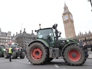 Tractors lined up outside the Houses of Parliament in Westminster, London, during a protest by farmers