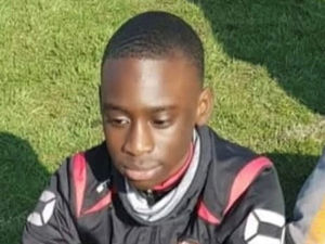Supporting image for story: Teenager charged with murder of 16-year-old found stabbed in road