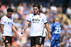 Walsall defender Mason Hancock cuts a frustrated figure at Gillingham. (Image by Owen Russell)