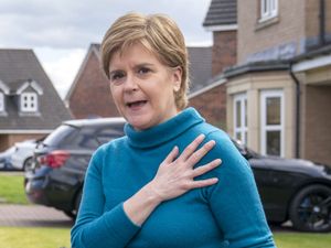Nicola Sturgeon speaking outside her home