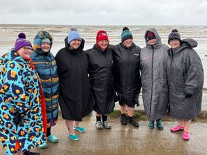 Supporting image for story: Fearless breast cancer survivors' icy plunge raises funds for charity