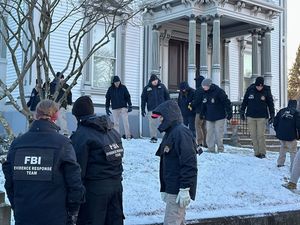 Supporting image for story: Search for the Brown University gunman resumes after person of interest released