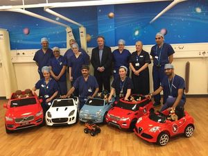 Supporting image for story: Car dealer group goes the extra mile to help children get to surgery