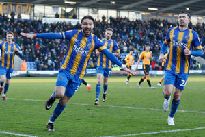 Luke Leahy celebrates after making it 1-0 (AMA)