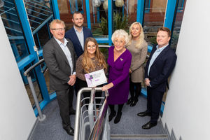 MFG Solicitors announced us as new patrons of Black Country Chamber of Commerce. Pictured is Gail Arnold, head of premium membership from Black Country Chamber along with Tim Lang  (Partner) and members of the MFG team at their new office at The Waterfront, Brierley Hill. Pic by Shaun Fellows / Shine Pix Ltd
