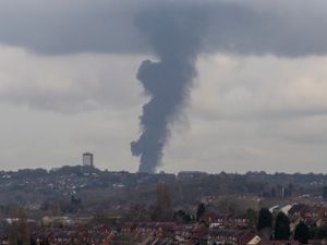 Supporting image for story: Large plastic fire tackled, with smoke plume visible for miles