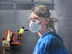 Supporting image for story: Kate praises ‘hugely moving’ image of nurse as photographic project ends