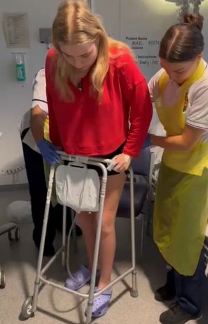 Madi Foster walking after septic shock. 