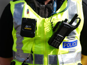 File photo dated 26/03/25 of a body-worn video camera being held during the Police Scotland national launch of body-worn video cameras at Dundee Police Station. A dedicated police taskforce has been set up in response to a rise in shoplifting and oth