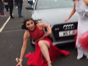 Supporting image for story: This teen’s prom entrance was interrupted after she was accidentally hit by a car