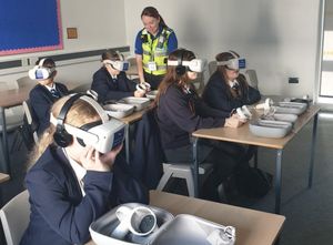 The VR headsets help students to make a number of decisions linked to knife carrying. Photo: Staffordshire Police