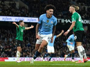 Manchester City’s Nico O’Reilly celebrates scoring the second of his two goals against Plymouth