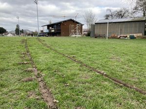 The tractor tyres across the pitch 