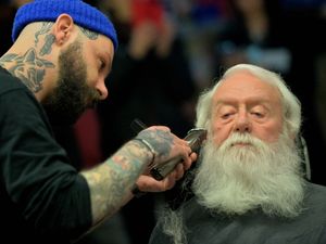 Supporting image for story: Shrewsbury Santa receives makeover as beard is shaved for charity