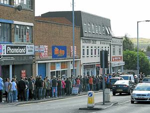 Supporting image for story: Hundreds queue for final sale at music shop