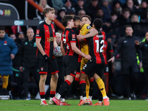 Matheus Cunha clashes with Milos Kerkez (Photo by Ryan Pierse/Getty Images)