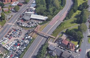 An aerial view showing the footbridge over Duncan Edwards Way. Photo: Google