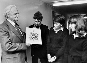 October 1980 - 'Mr Norman Pickering, deputy head of John Hunt School, Trench, showing the new hand-painted coat of arms to, from left, fourth formers Jonathan Webster, Wendy Freeman and Jaqueline Urquhart.' John Hunt School merged with Hadley Manor School later to become Sutherland School, which closed July 2015, being amalgamated with Wrockwardine Wood school on a new site in Oakengates